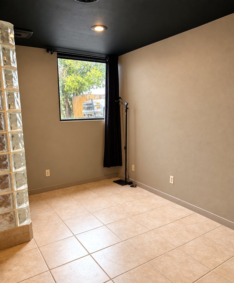 Private suite with a large window and tile floor at Springs Spa & Salon in Colorado Springs